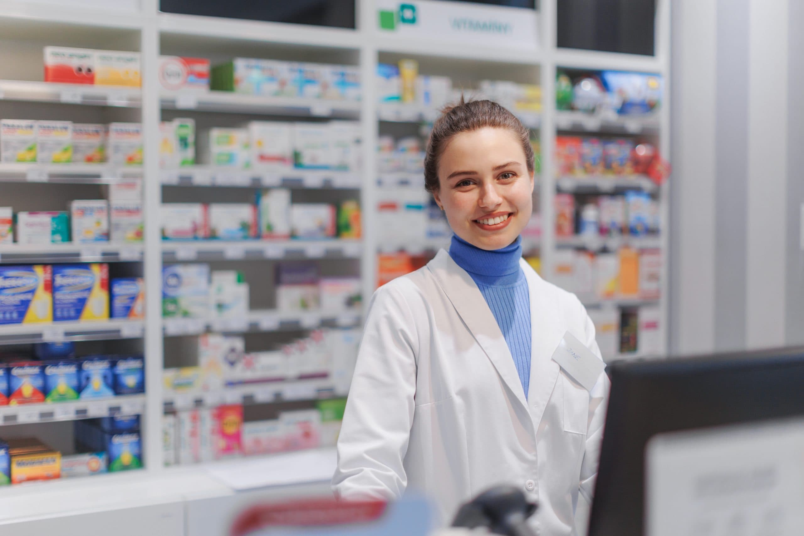 Friendly pharmacist ready to help at EA Pharma Group